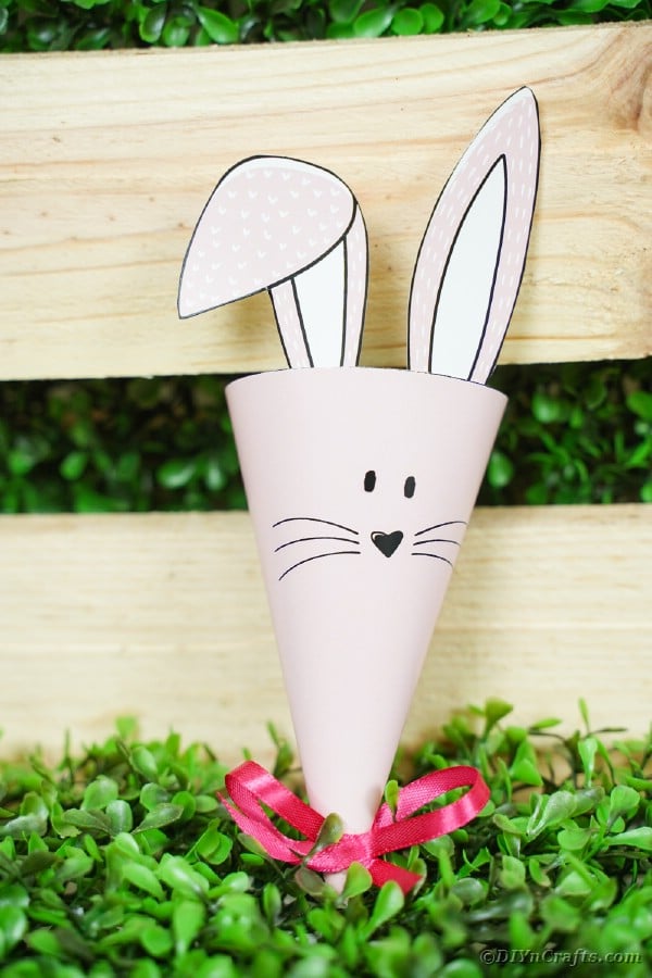 Paper bunny cone in front of wood box