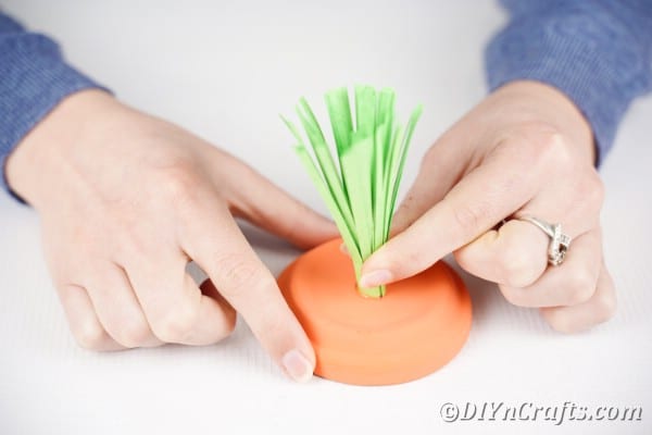 Gluing paper stem to top of flower pot