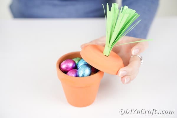 Filling flower pot with candy