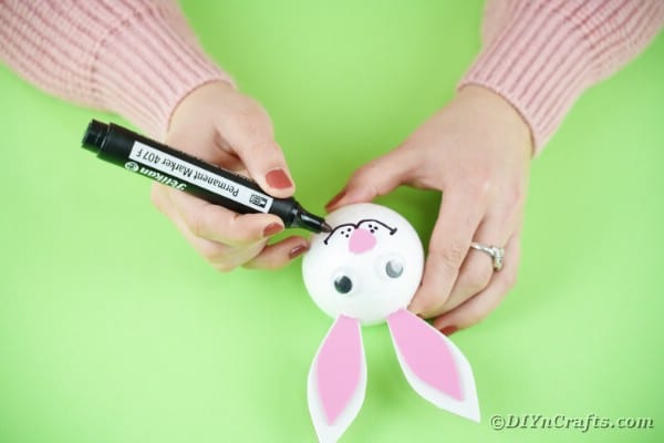 Adding smile to easter bunny head