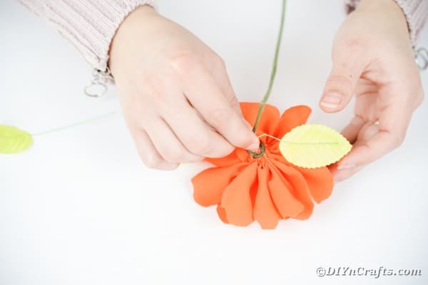 Adding a leave to a fabric flower