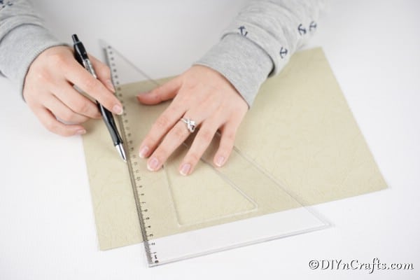 Measuring paper with ruler