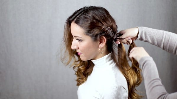 Braiding hair down side of head