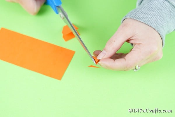 Cutting beak from orange paper