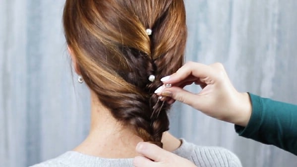 Adding hair pin accents to braid