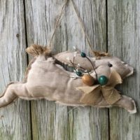 Primitive Hanging Easter Bunny with Pip Berries and Eggs