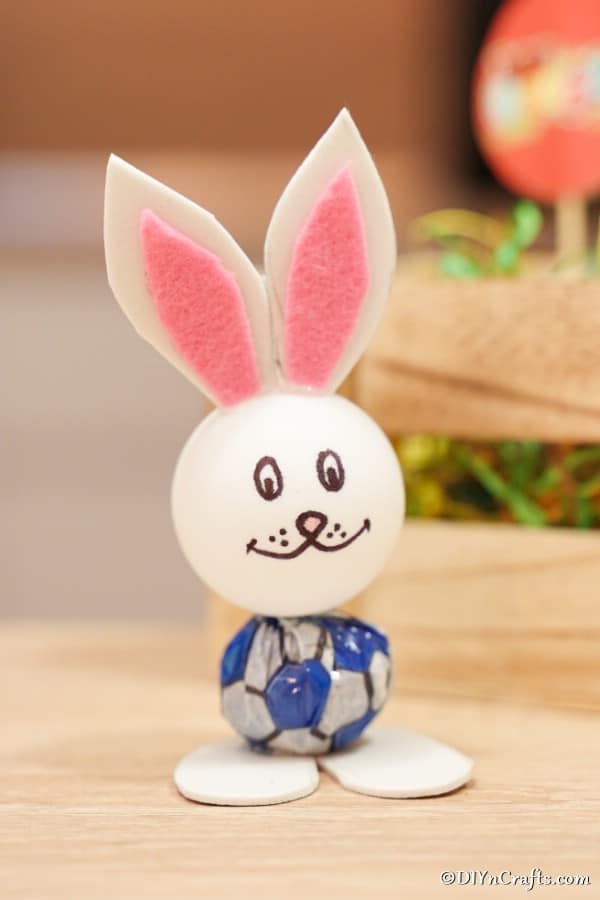 Lollipop bunny with pink ears on table