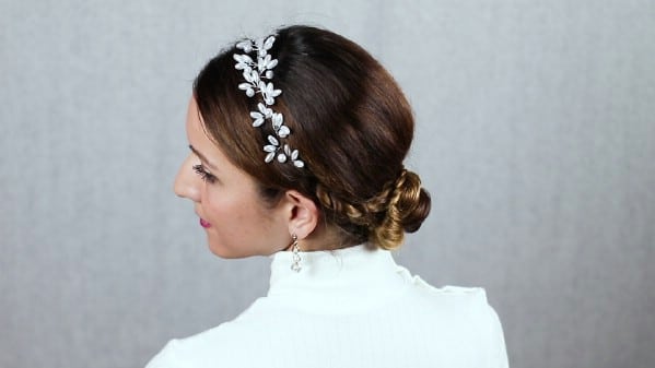 Side view of braided low bun hairstyle