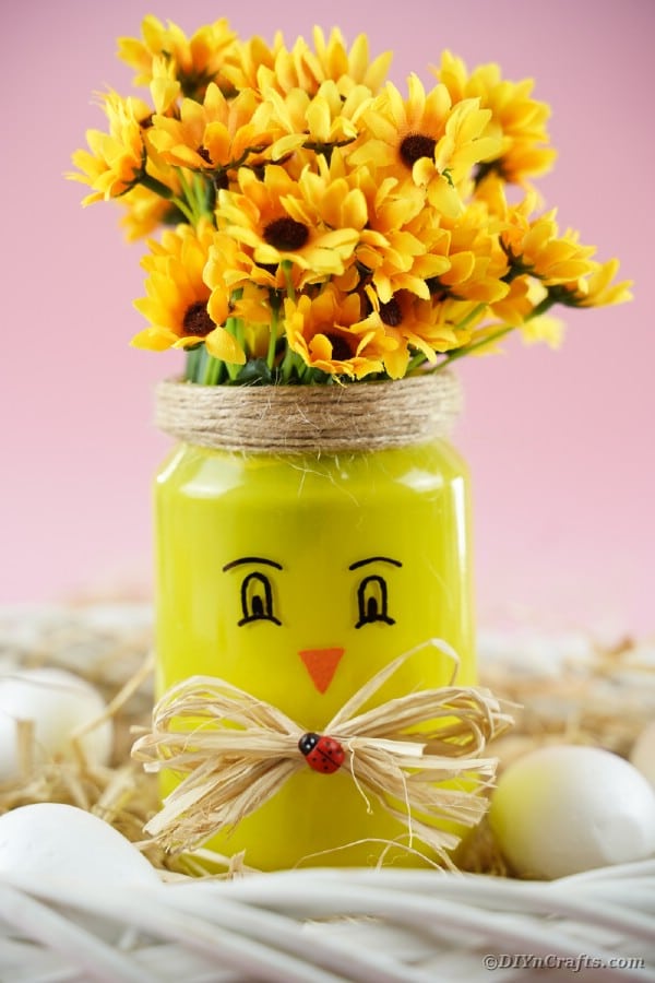 Mason jar chicken filled with yellow flowers