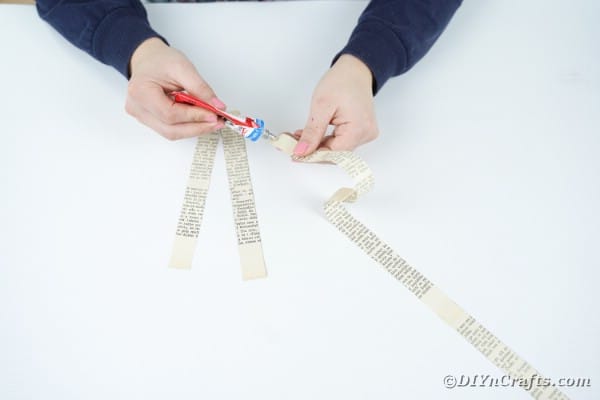 Gluing page strips together