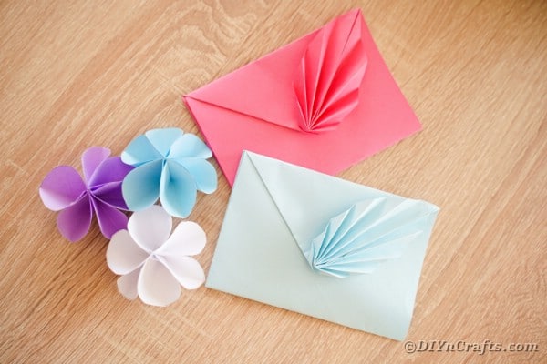 Origami envelope on wooden table