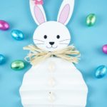 Paper Easter bunny on blue background