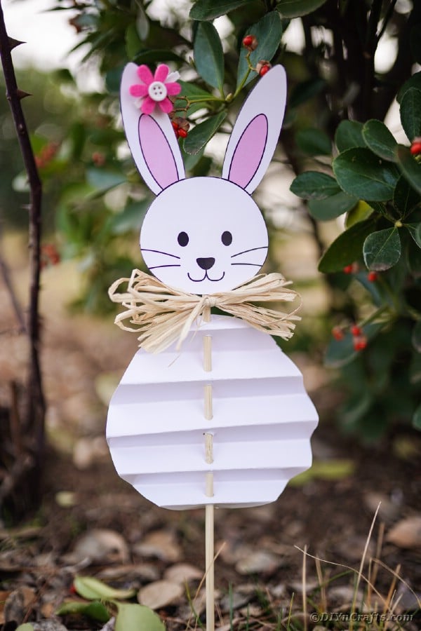 Paper Easter bunny next to tree