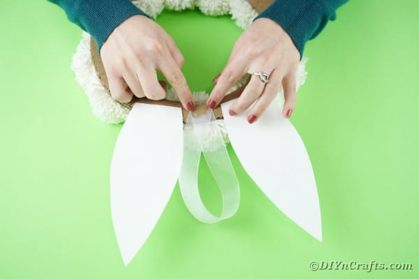 Adding loop of ribbon for hanging
