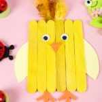 Craft stick chicken on pink table
