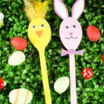 Wooden spoon bunny and chicken on grass