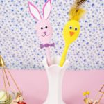 Wooden spoon and wooden bunny in vase