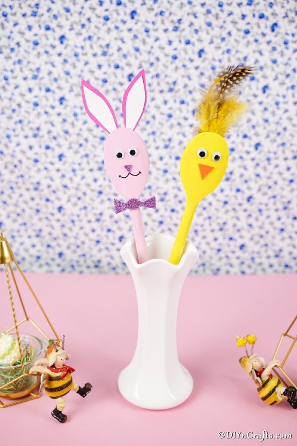 Wooden spoon and wooden bunny in vase