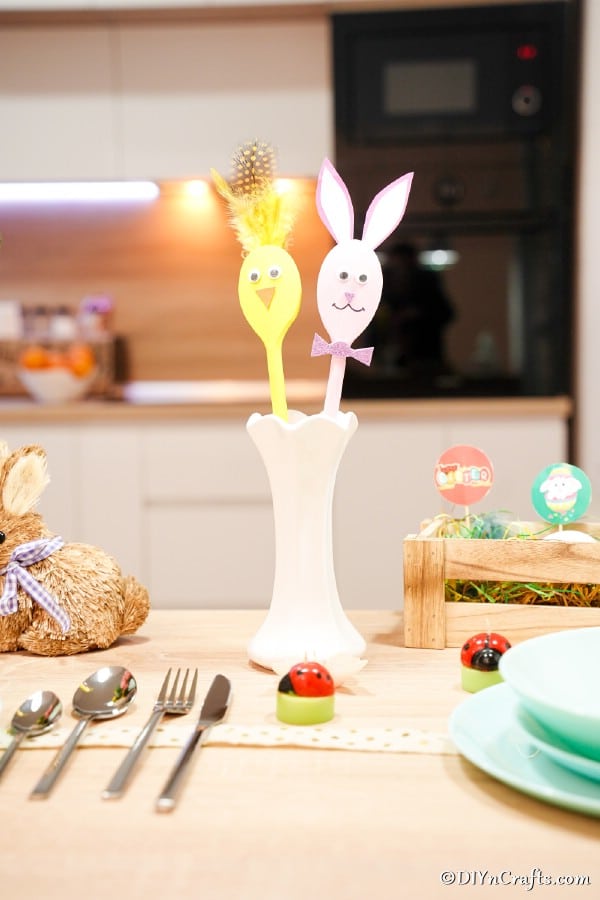 Easter wooden spoons on table