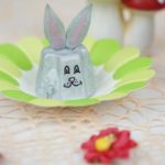 Egg carton bunny on paper flower with red flowers