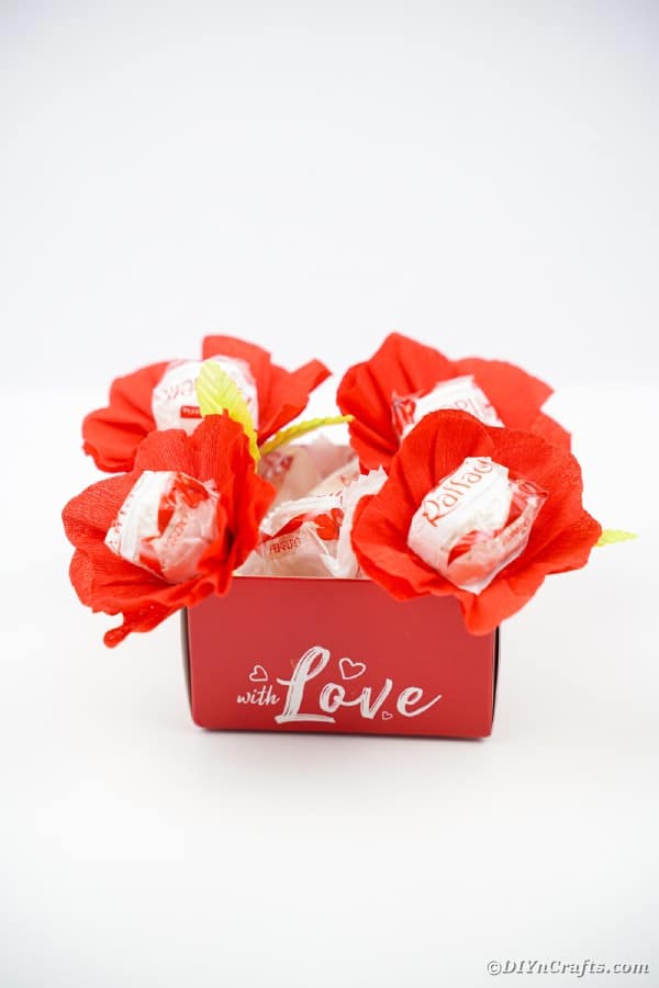 Red paper flowers on chocolates