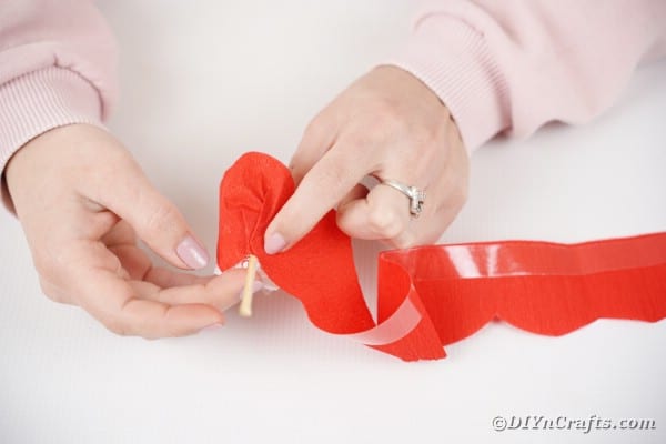 Wrapping candy with paper flower