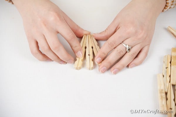 Three sets of clothespins glued together