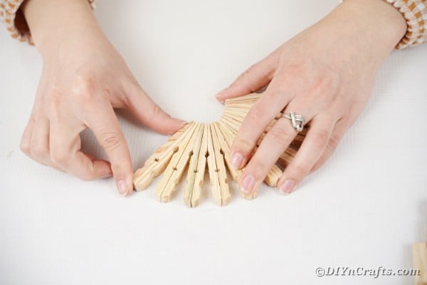 12 sets of clothespins glued together