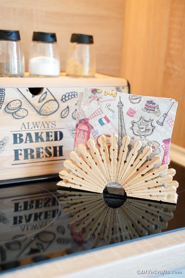 Clothespin napkin holder in front of bread box