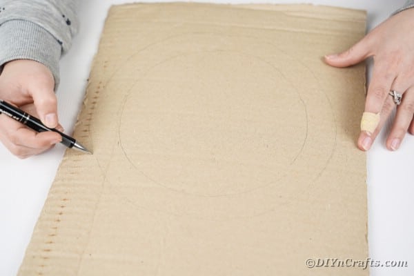 Drawing circle on cardboard