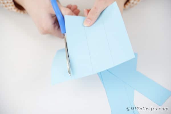Cutting strips of paper