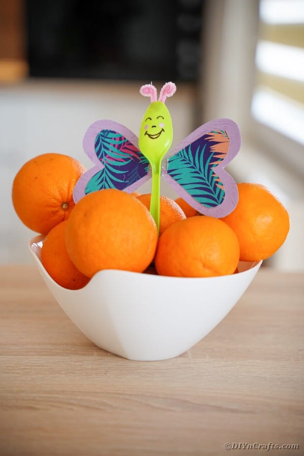 Purple butterfly spoon in oranges
