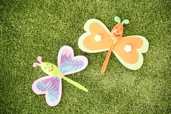 Butterfly spoons on grass