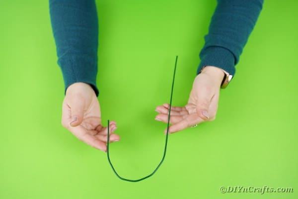 Folding floral wire into a hook shape