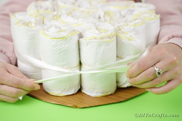 Tying diapers together with a ribbon