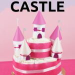 Diaper castle in front of pink wall