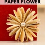 Old book page flower against red book