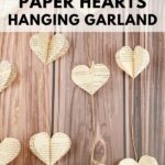 Hanging heart garland on brown wood table