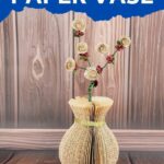 Paper vase in front of wooden background