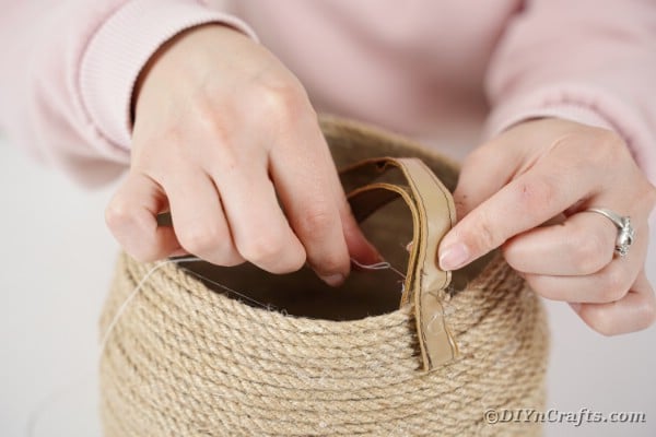 Attaching handle to basket