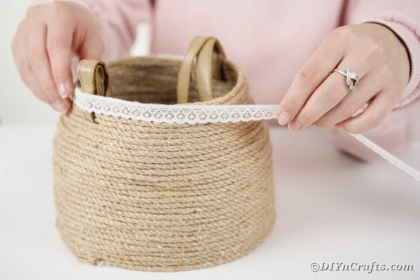 Gluing lace onto rope basket