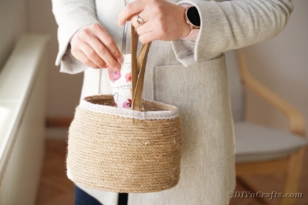 Woman holding a rope basket