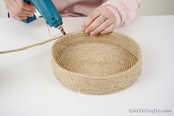 Gluing a rope side on basket