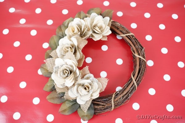 Rose wreath on red polka dot table