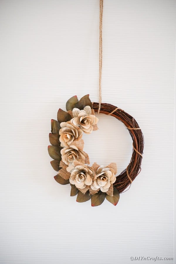 Book page wreath on white background