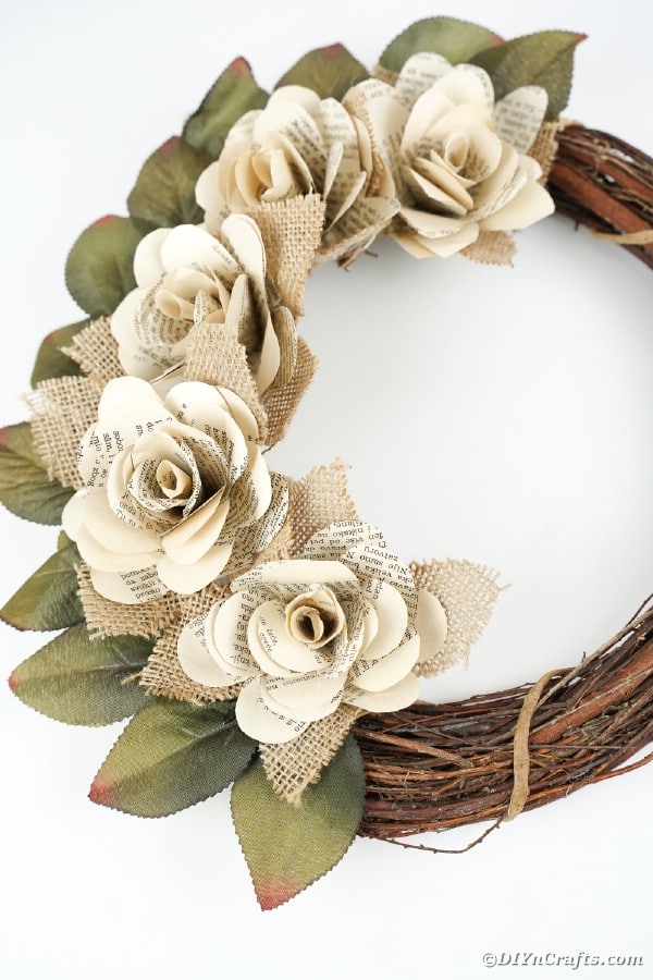Book page wreath on white background