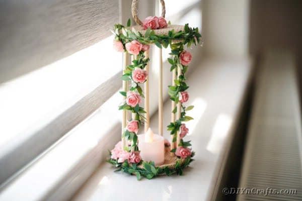 Candle holder in windowsill