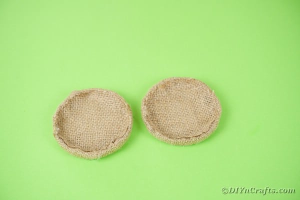 Two burlap wrapped lids