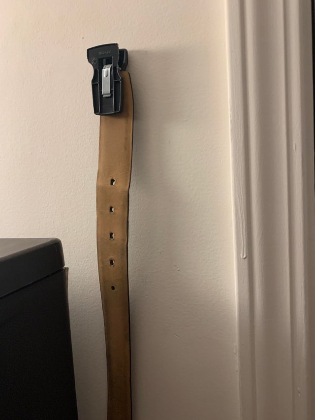 Belt hanging on wall