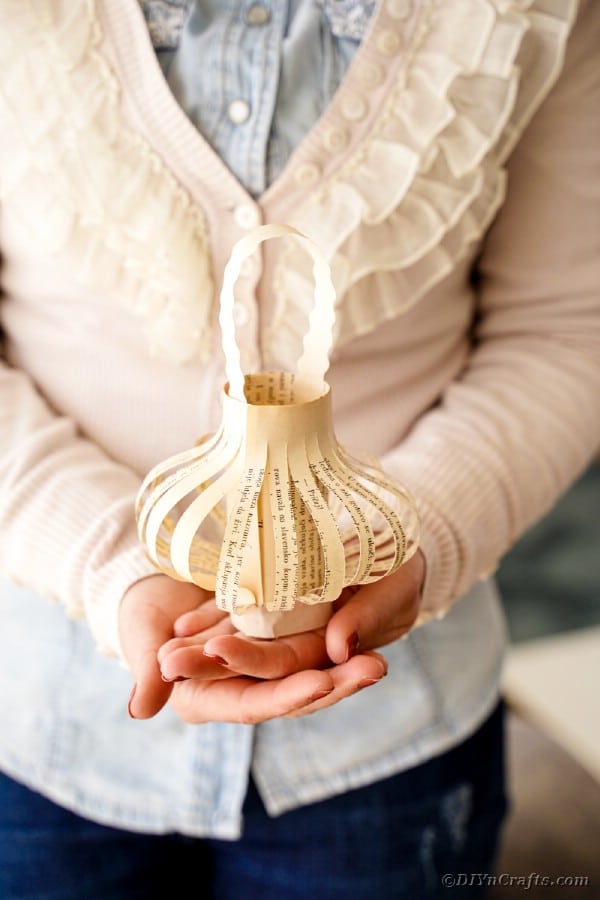 Woman holding paper lantern